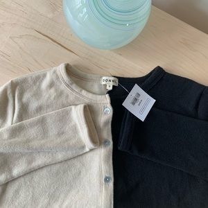 Donni duo sweater is size small